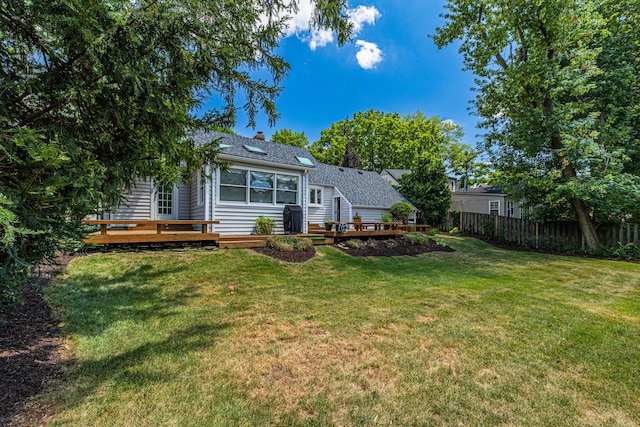 1618 Birmingham Blvd, Birmingham, MI 48009 - rear view of property featuring a deck, a shingled roof, and a chimney