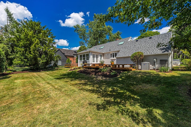 1618 Birmingham Blvd, Birmingham, MI 48009 - rear view of property featuring a wooden deck, a yard, and a shingled roof