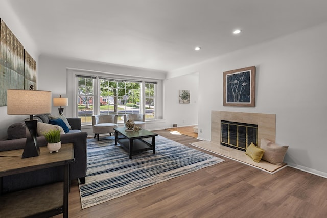 1618 Birmingham Blvd, Birmingham, MI 48009 - living room featuring wood finished floors, a tile fireplace, and recessed lighting