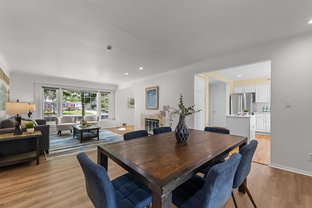 1618 Birmingham Blvd, Birmingham, MI 48009 - dining space featuring light wood finished floors and recessed lighting