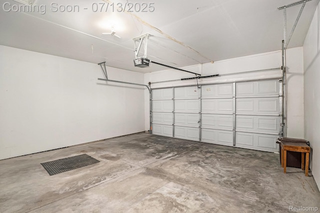 7031 Iris Ct Unit 3, Grand Blanc, MI 48439 - garage with a garage door opener