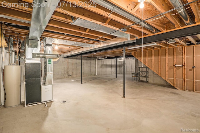 7031 Iris Ct Unit 3, Grand Blanc, MI 48439 - unfinished basement with water heater and heating unit