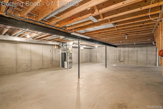 7031 Iris Ct Unit 3, Grand Blanc, MI 48439 - unfinished basement with heating unit