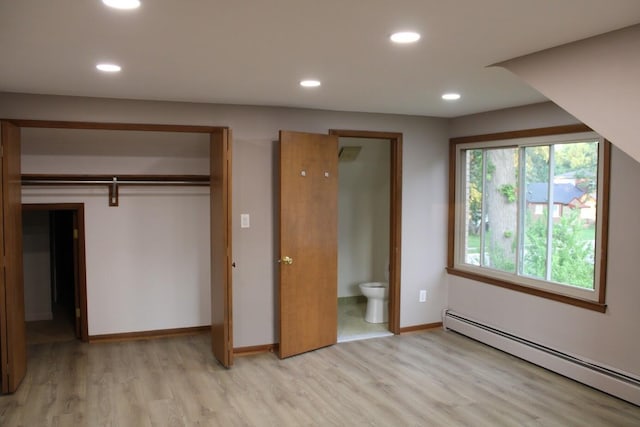 2906 Syracuse St, Dearborn, MI 48124 - unfurnished bedroom with a baseboard radiator, light wood-type flooring, and recessed lighting