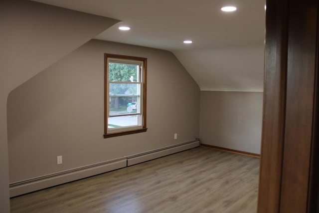 2906 Syracuse St, Dearborn, MI 48124 - additional living space featuring a baseboard heating unit, light wood-type flooring, lofted ceiling, and recessed lighting