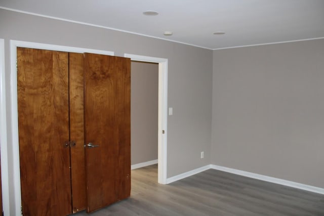 2906 Syracuse St, Dearborn, MI 48124 - unfurnished bedroom featuring wood finished floors and ornamental molding