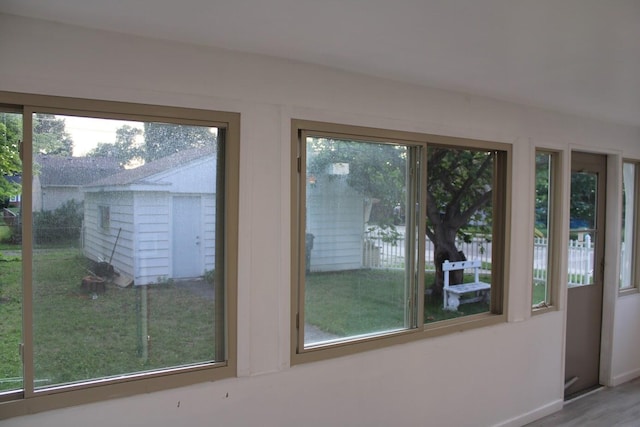 2906 Syracuse St, Dearborn, MI 48124 - doorway with baseboards and wood finished floors
