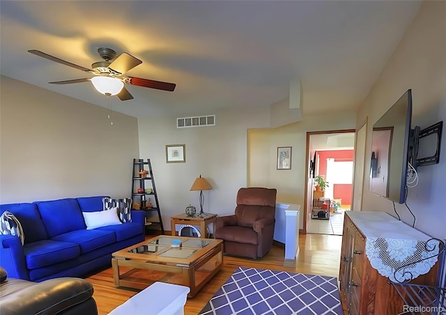 10352 Gulley St, Taylor, MI 48180 - living room featuring light wood-style floors and ceiling fan