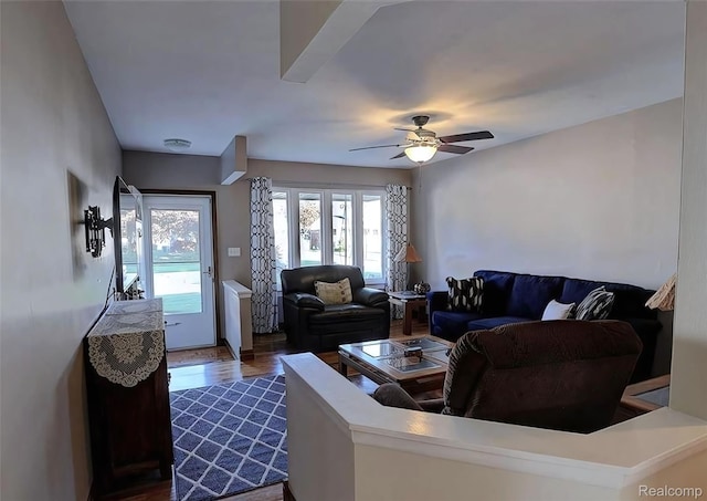 10352 Gulley St, Taylor, MI 48180 - living area with ceiling fan and dark wood finished floors