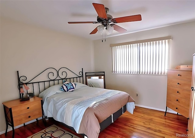 10352 Gulley St, Taylor, MI 48180 - bedroom with wood finished floors and a ceiling fan