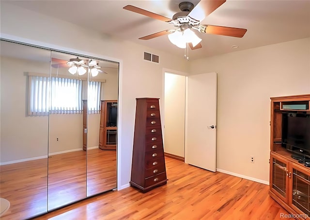10352 Gulley St, Taylor, MI 48180 - unfurnished bedroom with a closet, light wood-style flooring, and ceiling fan