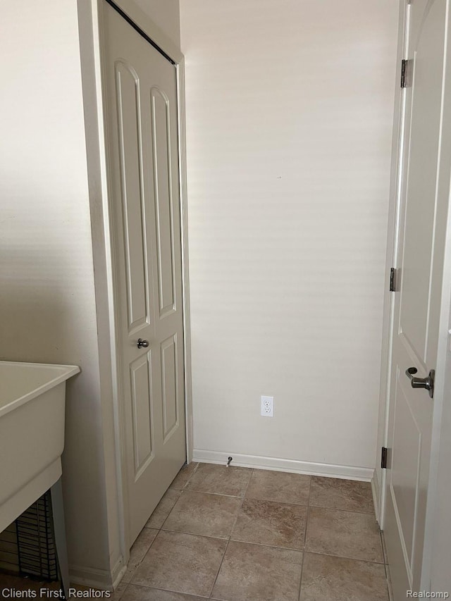 1082 Paddock Dr Unit 78, South Lyon, MI 48178 - corridor with baseboards