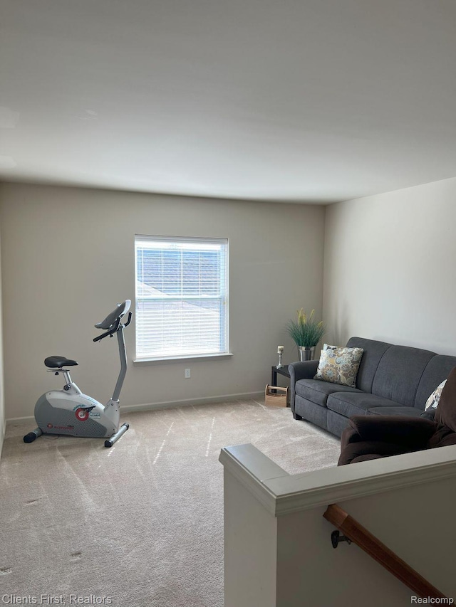 1082 Paddock Dr Unit 78, South Lyon, MI 48178 - living area with carpet floors and baseboards