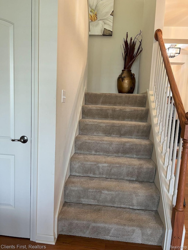 1082 Paddock Dr Unit 78, South Lyon, MI 48178 - stairs with wood finished floors