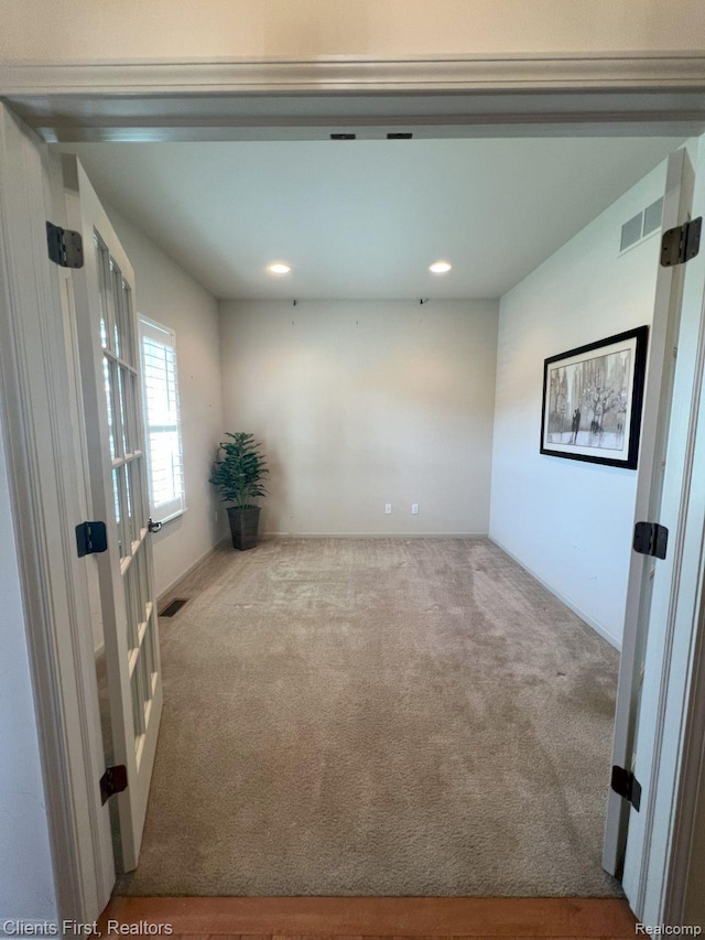 1082 Paddock Dr Unit 78, South Lyon, MI 48178 - spare room with carpet flooring and recessed lighting