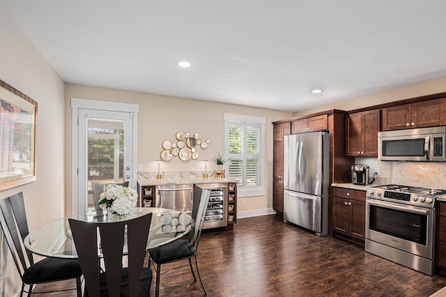 330 Rachaels Way, Spring Lake, MI 49456 - kitchen featuring stainless steel appliances, dark wood-style flooring, dark brown cabinetry, wine cooler, and recessed lighting