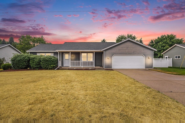 8728 Cottonwood Dr, Jenison, MI 49428 - ranch-style home featuring covered porch, concrete driveway, an attached garage, and roof with shingles