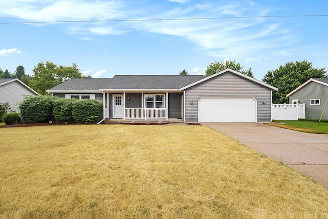 8728 Cottonwood Dr, Jenison, MI 49428 - ranch-style home featuring a porch, a garage, concrete driveway, and roof with shingles