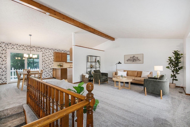 8728 Cottonwood Dr, Jenison, MI 49428 - living room featuring light colored carpet and a chandelier