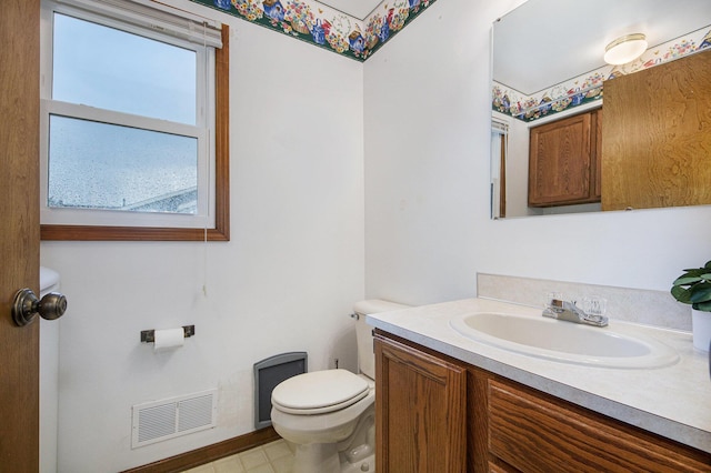 8728 Cottonwood Dr, Jenison, MI 49428 - half bath featuring toilet and vanity