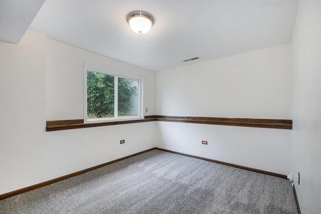 8728 Cottonwood Dr, Jenison, MI 49428 - spare room with carpet and baseboards
