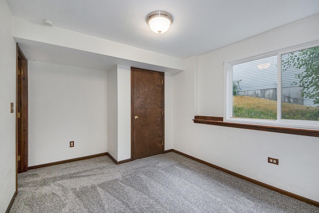 8728 Cottonwood Dr, Jenison, MI 49428 - unfurnished bedroom featuring carpet flooring and a closet