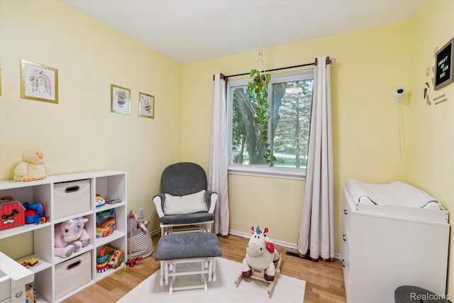 3439 N Mill Rd, Dryden, MI 48428 - sitting room featuring wood finished floors and baseboards