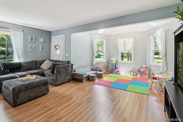 3439 N Mill Rd, Dryden, MI 48428 - living area with light wood-type flooring
