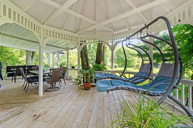 3439 N Mill Rd, Dryden, MI 48428 - deck featuring a gazebo and outdoor dining area