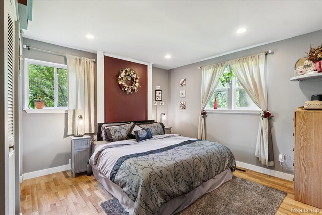 3439 N Mill Rd, Dryden, MI 48428 - bedroom with light wood-type flooring and recessed lighting