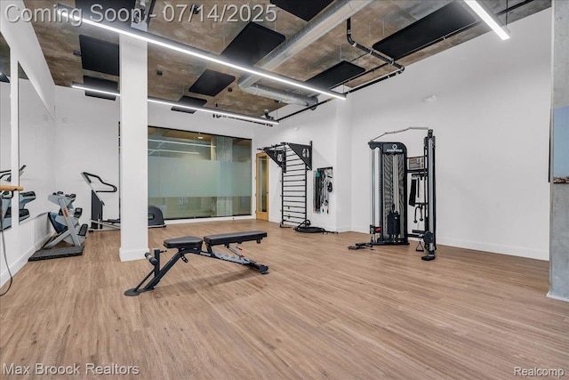 2051 Villa Rd Unit 302, Birmingham, MI 48009 - exercise area featuring wood finished floors and baseboards
