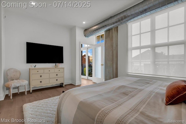 2051 Villa Rd Unit 302, Birmingham, MI 48009 - bedroom with wood finished floors, access to outside, and recessed lighting