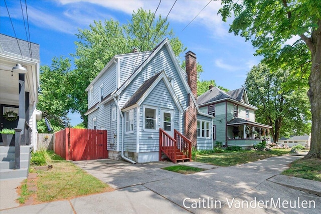 1340 Ashland Ave NE, Grand Rapids, MI 49505 - view of front of house featuring a chimney