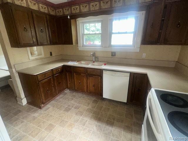 12100 Elmview St, Romulus, MI 48174 - kitchen with white appliances and light countertops