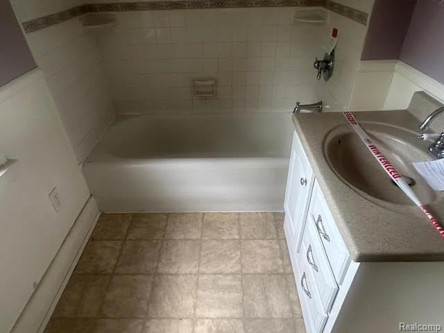 12100 Elmview St, Romulus, MI 48174 - bathroom with vanity and shower / tub combination