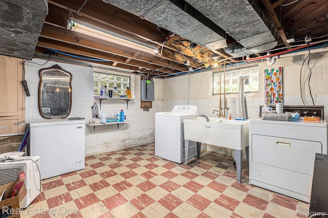 35451 John St, Wayne, MI 48184 - basement with independent washer and dryer, tile patterned floors, electric panel, and fridge