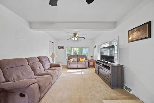 350 N Horton St, Jackson, MI 49202 - living area with ceiling fan, light carpet, and beamed ceiling