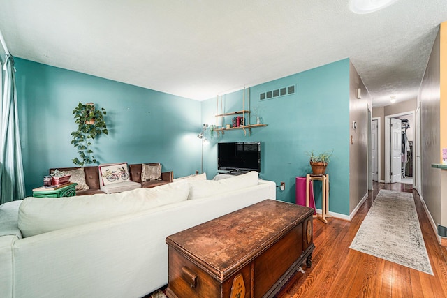 471 Dupont Ave, Ypsilanti, MI 48197 - living room featuring wood finished floors and baseboards