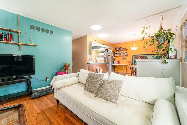 471 Dupont Ave, Ypsilanti, MI 48197 - living area featuring wood finished floors