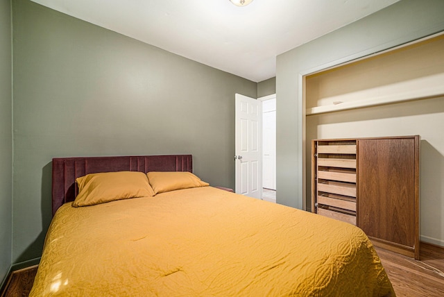 471 Dupont Ave, Ypsilanti, MI 48197 - bedroom with wood finished floors and baseboards
