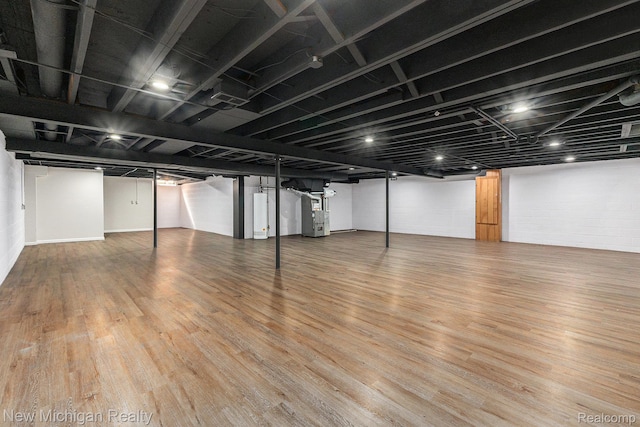 23306 Greencrest St, Saint Clair Shores, MI 48080 - finished below grade area with wood finished floors and water heater