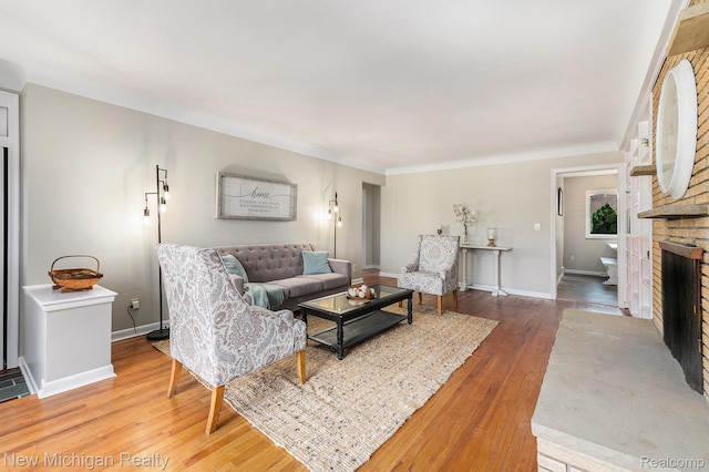 23306 Greencrest St, Saint Clair Shores, MI 48080 - living room with a fireplace and wood finished floors