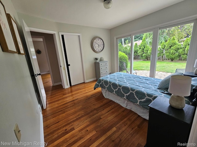 23306 Greencrest St, Saint Clair Shores, MI 48080 - bedroom featuring wood finished floors and access to exterior