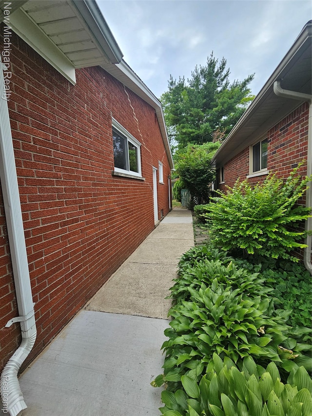 23306 Greencrest St, Saint Clair Shores, MI 48080 - view of property exterior with brick siding