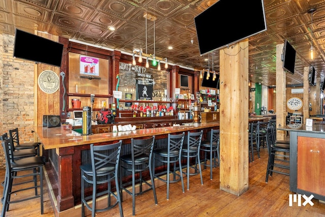 139 Pearl St NW, Grand Rapids, MI 49503 - indoor dry bar with an ornate ceiling and wood finished floors