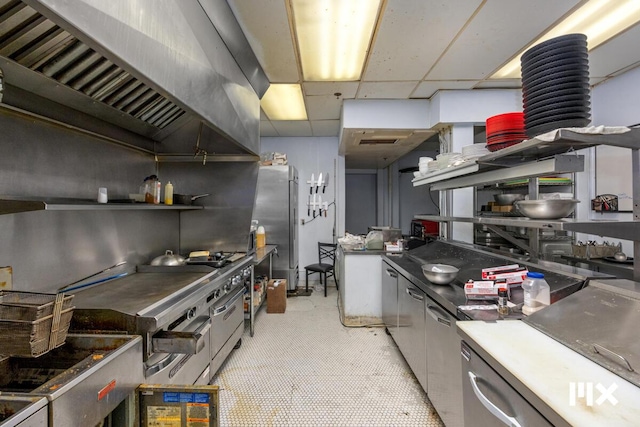 139 Pearl St NW, Grand Rapids, MI 49503 - kitchen featuring freestanding refrigerator, open shelves, a paneled ceiling, stovetop, and premium range hood