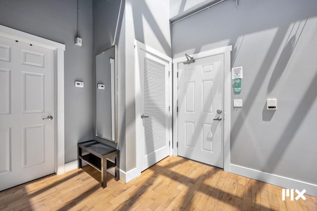 139 Pearl St NW, Grand Rapids, MI 49503 - foyer entrance featuring hardwood / wood-style flooring and baseboards