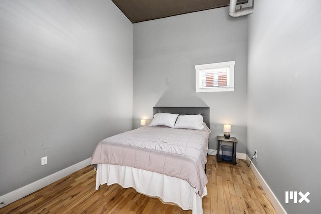 139 Pearl St NW, Grand Rapids, MI 49503 - bedroom featuring wood finished floors and baseboards