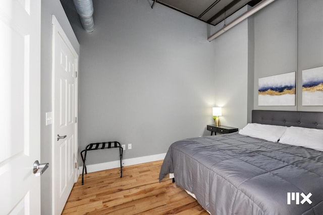 139 Pearl St NW, Grand Rapids, MI 49503 - bedroom with wood finished floors and baseboards
