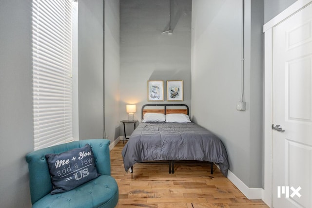 139 Pearl St NW, Grand Rapids, MI 49503 - bedroom with wood finished floors and baseboards